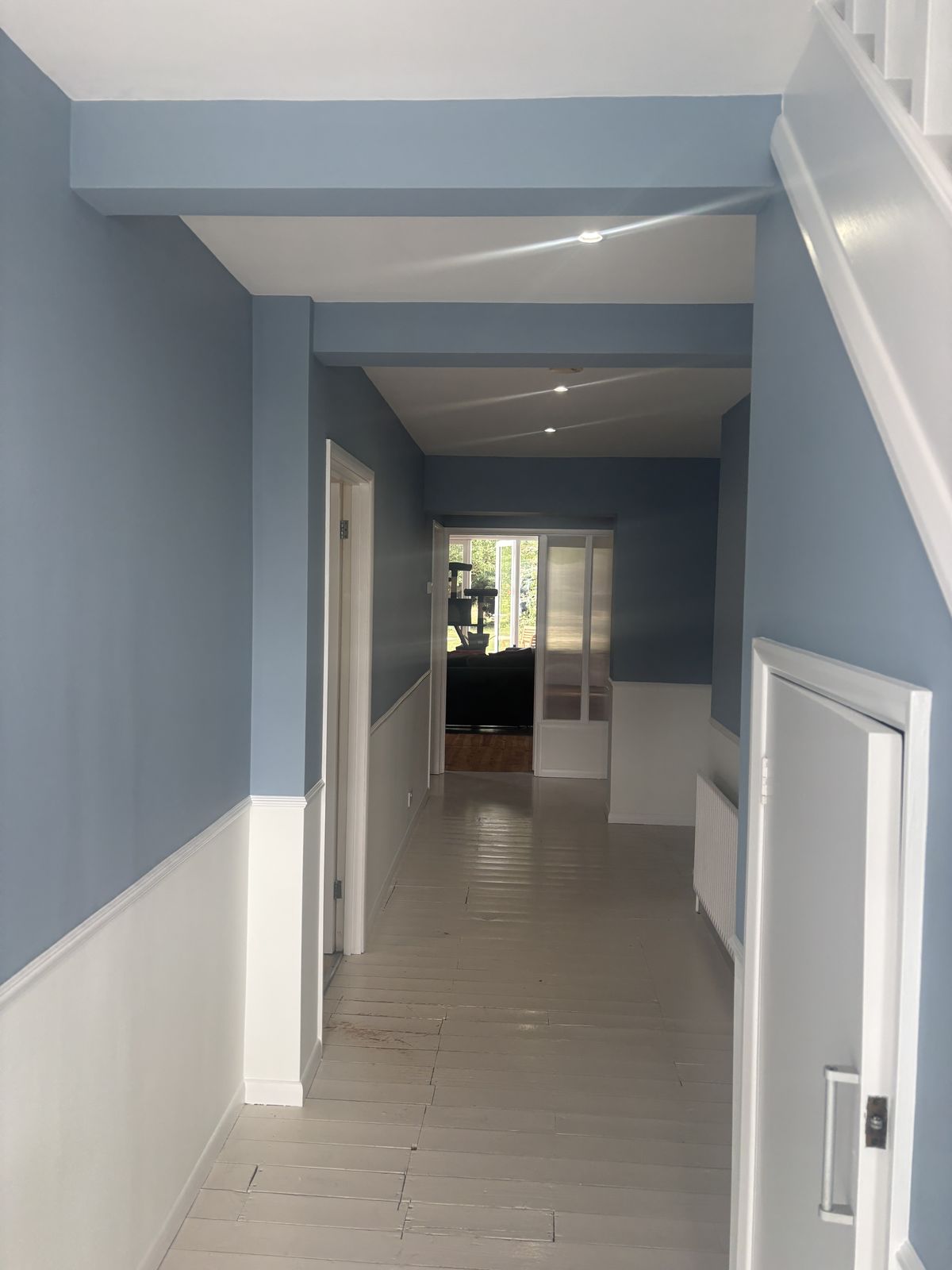 Two-tone hallway redecoration with painted floorboards by DPK Carpentry & Decorating